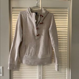 Pullover sweater with wood buttons